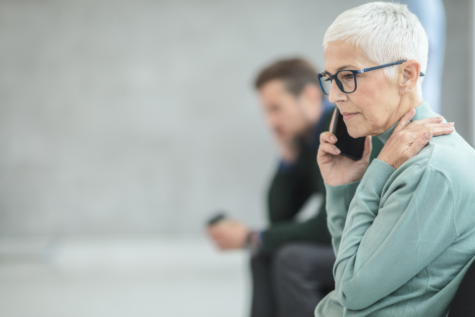 Missed website leads - customer looking at a phone before leaving a business website